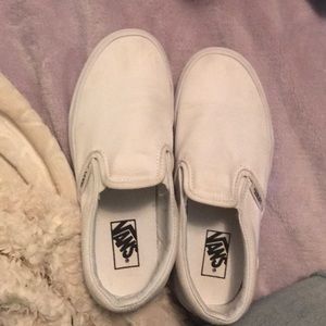 All white slip on vans
